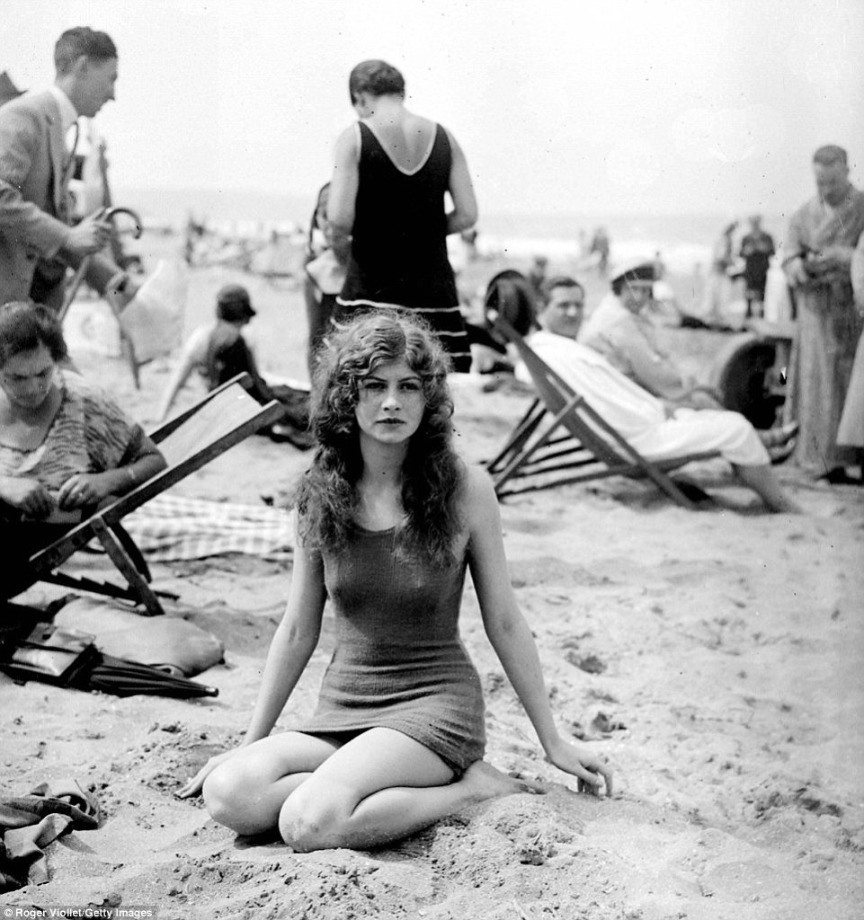 thoughful woman on beach normandy 1920s